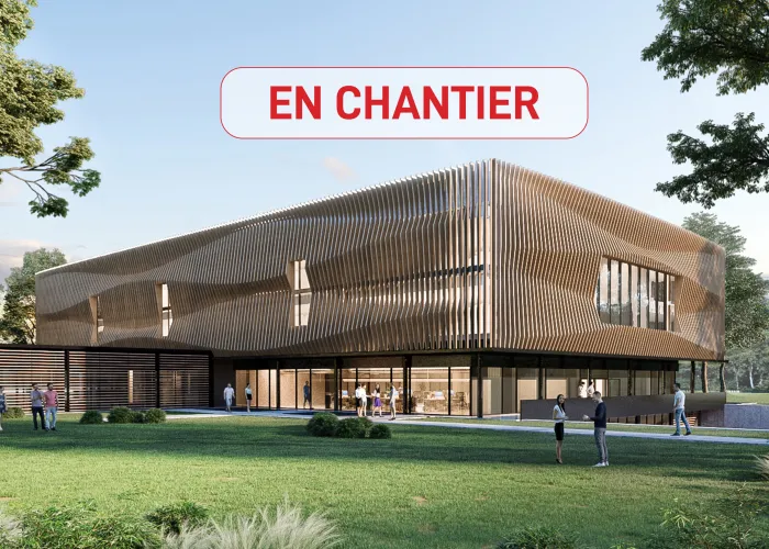 perspective extérieure de l'immeuble projeté avec des lettres "en chantier"